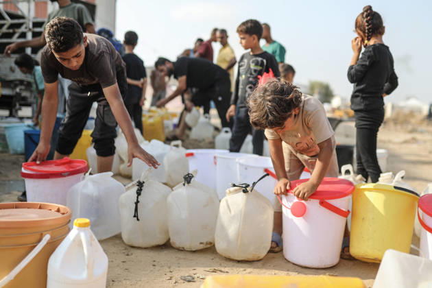 Palestinians still lack basic necessities amid Israel attacks DEIR AL BALAH, GAZA, PALESTINE - OCTOBER 10: Palestinians living in tents set up in the Bureij area carry water in containers to their makeshift shelters in Deir al Balah, Gaza, Palestine on October 10, 2026.The humanitarian crisis in the region continues to deepen, with thousands of displaced families struggling to survive without access to the most basic necessities. Adam Bilal Anadolu Deir al Balah Gaza. Editorial use only. Please get in touch for any other usage.  Copyright: x2026xAnadoluxAdamxBilalx