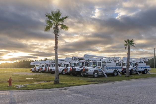 October 10, 2026, Orange Beach, Al, USA: Utility trucks are staged for repairs in the aftermath of Hurricane Isaias as dawn breaks over the Gulf Coast..Hurricane Isaias made landfall Friday night. Orange Beach USA - ZUMAs197 20261010_aaa_s197_001 Copyright: xJenxGolbeckx