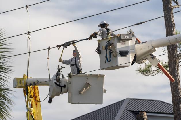 October 10, 2026, Orange Beach, Al, USA: Crews work to repair power lines after a tree fell on them as Hurricane Isaias came ashore..Hurricane Isaias made landfall Friday, October 9 along the U.S. Gulf coast. Orange Beach USA  - ZUMAs197 20261010_aaa_s197_005 Copyright: xJenxGolbeckx