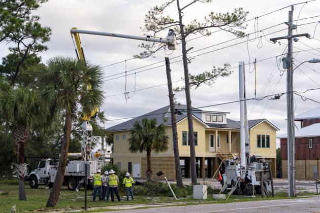 October 10, 2026, Orange Beach, Al, USA: Crews work to repair power lines after a tree fell on them as Hurricane Isaias came ashore..Hurricane Isaias made landfall Friday, October 9 along the U.S. Gulf coast. Orange Beach USA  - ZUMAs197 20261010_aaa_s197_004 Copyright: xJenxGolbeckx
