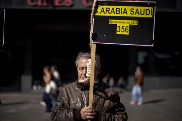 October 10, 2026, Madrid, Madrid, Spain: Protesters with signs and nooses around their necks during a rally at Callao Square in central Madrid. World Day Against the Death Penalty has been observed every October 10th since 2003. Madrid Spain  - ZUMAs296 20261010_znp_s296_008 Copyright: xLuisxSotox