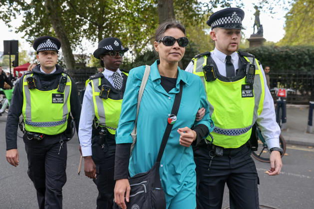 October 10, 2026, London, London, UK: London, UK. A pro-Palestine supporter is detained by the police for holding a sign as thousands of take part in the National March for Palestine in central London, carrying placards and Palestinian flags and calling for Palestinian rights and an end to the conflict in Gaza, three days after the third anniversary of the 7 October attacks on Israel. London UK  - ZUMAl94_ 20261010_zaf_l94_038 Copyright: xDinendraxHariax