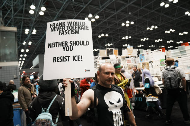 October 10, 2026, New York, New York, USA: A fan of The Punisher holds an anti-fascism and anti-CE sign at the 2026 NY Comic Con at the Javits Center on October 10, 2026 in New York. New York USA - ZUMAb148 20261010_zap_b148_030 Copyright: xBryanxSmithx