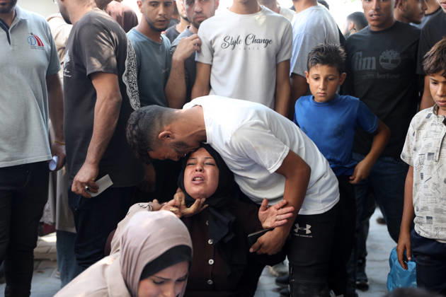 Palestinians Mourn Victims of Israeli Attack in Gaza City Palestinians mourn beside the bodies of their loved ones at al-Shifa Hospital in Gaza City, on October 10, 2026, after they were killed in an Israeli attack. The attack comes as the Israeli army continues its strikes across the Gaza Strip despite a ceasefire. Photo by Mohammed Salha apaimages Gaza Gaza Strip Palestinian Territory 101026_Gaza_MS_00(11) Copyright: xapaimagesxMohammedxSalhax xapaimagesx