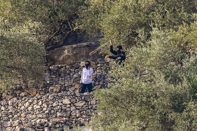 October 10, 2026, Ramallah: DEIR ABU MASHÃ¢â‚¬â ¢AL, PALESTINE Ã¢â‚¬ OCTOBER 10, 2026: Palestinian farmers came under attack by Israeli settlers and Israeli forces as they headed to harvest olives on their land in Deir Abu MashÃ¢â‚¬â ¢al, northwest of Ramallah. The event marked the villageÃ¢â‚¬â ¢s first olive harvest gathering of the new season. The Palestine Red Crescent Society reported that its teams treated nine people injured during the incident. The injuries included one caused by live ammunition to the thigh, two caused by rubber-coated metal bullets, and six resulting from physical assault. One of those struck by a rubber-coated metal bullet was photojournalist Issam Al-Rimawi. The incident occurred during the annual olive harve  - ZUMAq101 20261010_zna_q101_074 Copyright: xSalmanxMohsenxAlkhatibx