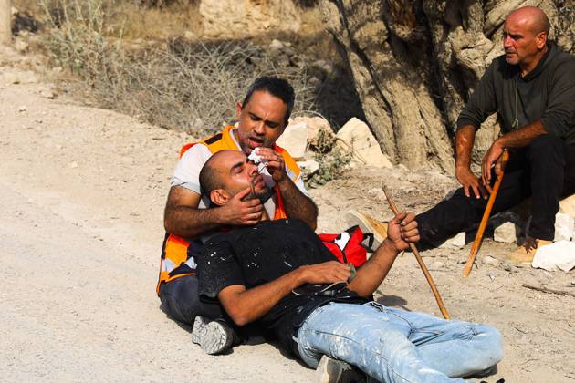 October 10, 2026, Ramallah: DEIR ABU MASHÃ¢â‚¬â ¢AL, PALESTINE Ã¢â‚¬ OCTOBER 10, 2026: Palestinian farmers came under attack by Israeli settlers and Israeli forces as they headed to harvest olives on their land in Deir Abu MashÃ¢â‚¬â ¢al, northwest of Ramallah. The event marked the villageÃ¢â‚¬â ¢s first olive harvest gathering of the new season. The Palestine Red Crescent Society reported that its teams treated nine people injured during the incident. The injuries included one caused by live ammunition to the thigh, two caused by rubber-coated metal bullets, and six resulting from physical assault. One of those struck by a rubber-coated metal bullet was photojournalist Issam Al-Rimawi. The incident occurred during the annual olive harve  - ZUMAq101 20261010_zna_q101_082 Copyright: xSalmanxMohsenxAlkhatibx