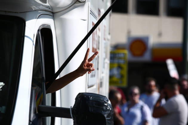 October 10, 2026, Athens, Attica, GREECE: A person extends an arm from a camper van window, making a victory sign during a pro-Palestinian demonstration. Athens GREECE  - ZUMAx103 20261010_zip_x103_022 Copyright: xHarrisxXanthopoulosx