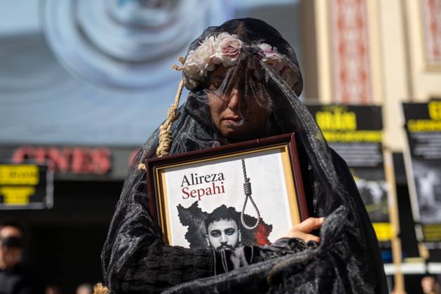 October 10, 2026, Madrid, Spain: A woman dressed in black as a sign of protest takes part in a demonstration in Madrid..Gathering at Madrid s Puerta del Sol to speak out against the death penalty...World Day Against the Death Penalty has been observed every October 10th since 2003, an initiative promoted by the World Coalition Against the Death Penalty. This day brings together activists, international organizations, legal experts, and human rights defenders to call for the universal abolition of capital punishment. Madrid Spain  - ZUMAs197 20261010_aaa_s197_086 Copyright: xDavidxCanalesx