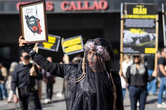 October 10, 2026, Madrid, Spain: A woman dressed in black as a sign of protest takes part in a demonstration in Madrid..Gathering at Madrid s Puerta del Sol to speak out against the death penalty...World Day Against the Death Penalty has been observed every October 10th since 2003, an initiative promoted by the World Coalition Against the Death Penalty. This day brings together activists, international organizations, legal experts, and human rights defenders to call for the universal abolition of capital punishment. Madrid Spain  - ZUMAs197 20261010_aaa_s197_088 Copyright: xDavidxCanalesx