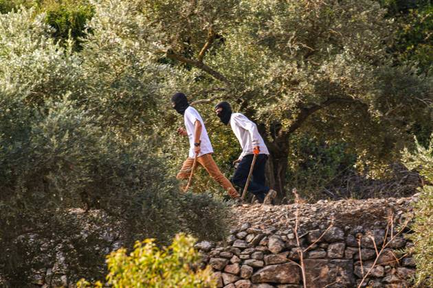 October 10, 2026, Ramallah: DEIR ABU MASHÃ¢â‚¬â ¢AL, PALESTINE Ã¢â‚¬ OCTOBER 10, 2026: Palestinian farmers came under attack by Israeli settlers and Israeli forces as they headed to harvest olives on their land in Deir Abu MashÃ¢â‚¬â ¢al, northwest of Ramallah. The event marked the villageÃ¢â‚¬â ¢s first olive harvest gathering of the new season. The Palestine Red Crescent Society reported that its teams treated nine people injured during the incident. The injuries included one caused by live ammunition to the thigh, two caused by rubber-coated metal bullets, and six resulting from physical assault. One of those struck by a rubber-coated metal bullet was photojournalist Issam Al-Rimawi. The incident occurred during the annual olive harve - ZUMAq101 20261010_zna_q101_063 Copyright: xSalmanxMohsenxAlkhatibx