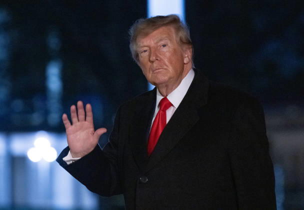 President Donald Trump waves to the media as he walks to the residence on the South Lawn of the White House in Washington DC on Saturday, October 10, 2026. The president was returning from Clarksville, Tennessee, following a campaign rally for Tennessee Republican candidates.  WAX20261010901 RonxSachs