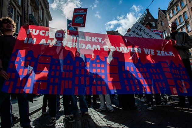October 10, 2026, Amsterdam, North Holland, Netherlands: Protesters are marching behind a banner against the housing market during the demonstration. People gathered against the worsening housing crisis. Under the motto Houses for people, not for profit, they demand fundamental changes in Dutch public housing. Amsterdam Netherlands  - ZUMAs197 20261010_aaa_s197_548 Copyright: xAnaxFernandezx
