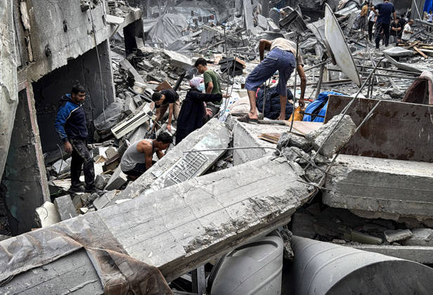 Palestinians Inspect Damage After Strike in Deir al-Balah Palestinians inspect their belongings amid the rubble of damaged residential buildings and their displacement tents after an Israeli airstrike targeted a house in Deir al-Balah, in the central Gaza Strip, on October 11, 2026. Photo by Ahmed Ibrahim apaimages Deir al-Balah Gaza Palestinian Territory 111026_Deir_al-Balah_AI_00(12) Copyright: xapaimagesxAhmedxIbrahimx xapaimagesx