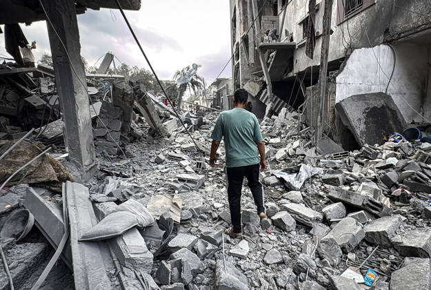 Palestinians Inspect Damage After Strike in Deir al-Balah Palestinians inspect their belongings amid the rubble of damaged residential buildings and their displacement tents after an Israeli airstrike targeted a house in Deir al-Balah, in the central Gaza Strip, on October 11, 2026. Photo by Ahmed Ibrahim apaimages Deir al-Balah Gaza Palestinian Territory 111026_Deir_al-Balah_AI_00(19) Copyright: xapaimagesxAhmedxIbrahimx xapaimagesx