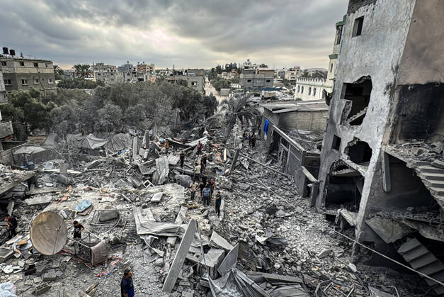 Palestinians Inspect Damage After Strike in Deir al-Balah Palestinians inspect their belongings amid the rubble of damaged residential buildings and their displacement tents after an Israeli airstrike targeted a house in Deir al-Balah, in the central Gaza Strip, on October 11, 2026. Photo by Ahmed Ibrahim apaimages Deir al-Balah Gaza Palestinian Territory 111026_Deir_al-Balah_AI_00(5) Copyright: xapaimagesxAhmedxIbrahimx xapaimagesx