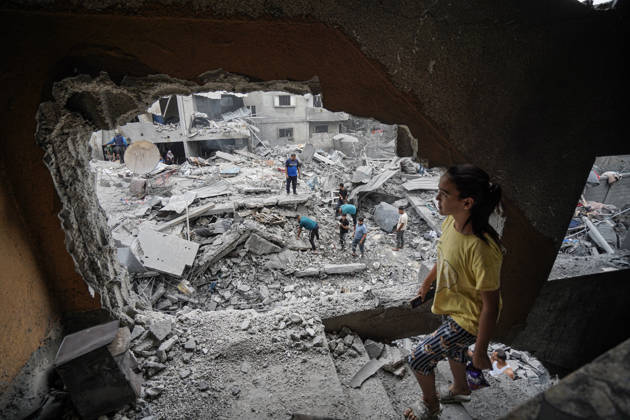 Israeli attack on Az-Zawayda area in Gaza DEIR AL-BALAH, GAZA, PALESTINE - OCTOBER 11: People are seen among the rubble of a building belonging to the Buheysi family following an Israeli airstrike in the town of Az-Zawayda, near Deir al-Balah in the central Gaza Strip, on October 11, 2026. Israeli Forces carried out the strike despite the ceasefire, destroying the building and damaging surrounding structures. Adam Bilal Anadolu Deir Al-Balah Gaza. Editorial use only. Please get in touch for any other usage.  Copyright: x2026xAnadoluxAdamxBilalx