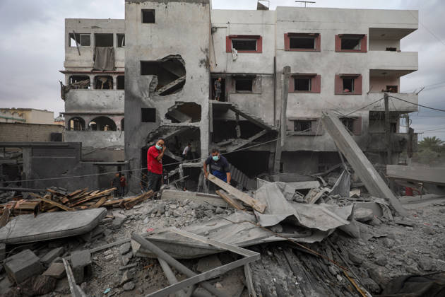 Palestinians Inspect Damage After Strike in Al-Zawayda Palestinians inspect their belongings amid the rubble of damaged residential buildings after an Israeli airstrike targeted a residential block in Al-Zawayda, in the central Gaza Strip, on October 11, 2026. Photo by Moiz Salhi apaimages Nusairat Gaza Strip Palestinian Territory 111026_Al-Zawayda_MS_00(29) Copyright: xapaimagesxMoizxSalhixx xapaimagesx