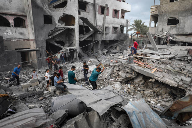 Palestinians Inspect Damage After Strike in Al-Zawayda Palestinians inspect their belongings amid the rubble of damaged residential buildings after an Israeli airstrike targeted a residential block in Al-Zawayda, in the central Gaza Strip, on October 11, 2026. Photo by Moiz Salhi apaimages Nusairat Gaza Strip Palestinian Territory 111026_Al-Zawayda_MS_00(32) Copyright: xapaimagesxMoizxSalhixx xapaimagesx