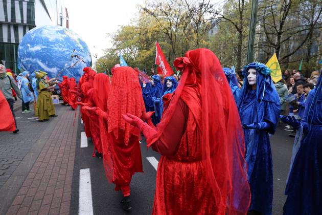This image shows the Climate March 2026, organized by the Climate Coalition, in Brussels, on Sunday 11 October 2026. The Climate Coalition demands the federal and regional governments to stop subsidizing polluting industrial activities in Belgium and levy higher taxes on these companies.  NICOLASxMAETERLINCK 189444419