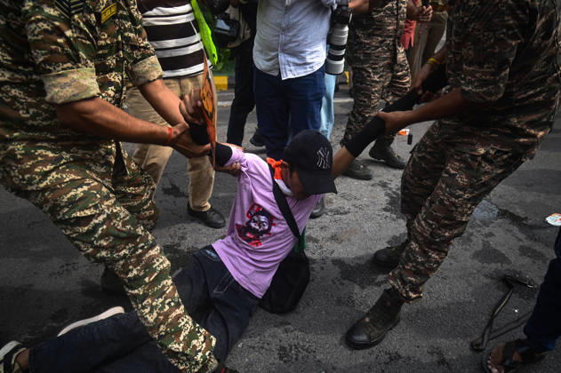 October 11, 2026, New Delhi, Delhi, India: Security personnel detain a protestor during a protest seeking the resignation of India s Chief Election Commissioner Gyanesh Kumar, over alleged electoral malpractices in the Special Intensive Revision (SIR) of electoral rolls, in New Delhi, India on October 11, 2026. New Delhi India - ZUMAj168 20261011_zip_j168_016 Copyright: xKabirxJhangianix