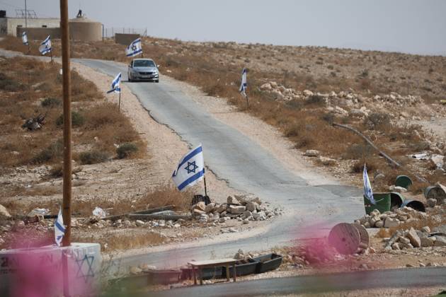 Settlers restrict access to Palestinian property UMM AL-KHAIR, MASAFER YATTA, OCCUPIED WEST BANK, OCTOBER 11, 2026: Israeli settlers placed barbed wire in the sheep pen yard and plastic sheets in front of the windows of the Salem al-Hathaleen family home in Umm al-Khair, Masafer Yatta, south of Hebron. The Israeli military subsequently declared the area a closed military zone, preventing the family from accessing the sheep pen and backyard, where a newly established settler outpost is located. MASAFER YATTA Palestine, State of Copyright: x xMosabxshawerx xJNAxPressx