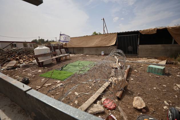 Settlers restrict access to Palestinian property UMM AL-KHAIR, MASAFER YATTA, OCCUPIED WEST BANK, OCTOBER 11, 2026: Israeli settlers placed barbed wire in the sheep pen yard and plastic sheets in front of the windows of the Salem al-Hathaleen family home in Umm al-Khair, Masafer Yatta, south of Hebron. The Israeli military subsequently declared the area a closed military zone, preventing the family from accessing the sheep pen and backyard, where a newly established settler outpost is located. MASAFER YATTA Palestine, State of Copyright: x xMosabxshawerx xJNAxPressx