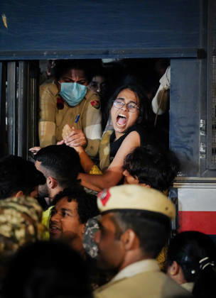 Police detain SFI members ahead of their planned Tiranga March at Connaught Place New Delhi, Oct 11 (ANI): Police detain Students™ Federation of India (SFI) members ahead of their planned Tiranga March at Connaught Place, in New Delhi on Sunday. New Delhi Delhi India Copyright: xANIx ANI_20261011429