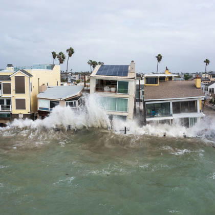 October 11, 2006, Long Beach, California, USA: The Long Beach Peninsula is facing severe, structural devastation as Tropical Storm Rachel batters the Southern California coast. Driven by a developing El Nino pattern, this is the fourth major storm system to slam the shoreline in six weeks. Waves and unusually high tides have shattered a 30-foot section of the protective wooden bulkhead, completely shredding the historic boardwalk and allowing seawater to surge directly onto interior streets. Flooding has swamped coastal neighborhoods, forcing mandatory evacuations along oceanfront blocks like Seaside Walk. Emergency crews are working to stack thousands of sandbags and reinforce coastal defenses, but city inspectors have already been forced - ZUMAr19_ 20261011_new_r19_142 Copyright: xRuaridhxStewartx