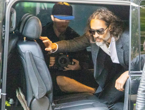 October 12, 2026, London, England, United Kingdom: RUSSELL BRAND arrives at Southwark Crown Court, where he is facing three charges of rape, indecent assault, and three counts of sexual assault, relating to six women. London United Kingdom - ZUMAs262 20261012_zip_s262_002 Copyright: xTayfunxSalcix