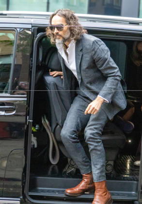October 12, 2026, London, England, United Kingdom: RUSSELL BRAND arrives at Southwark Crown Court, where he is facing three charges of rape, indecent assault, and three counts of sexual assault, relating to six women. London United Kingdom - ZUMAs262 20261012_zip_s262_003 Copyright: xTayfunxSalcix