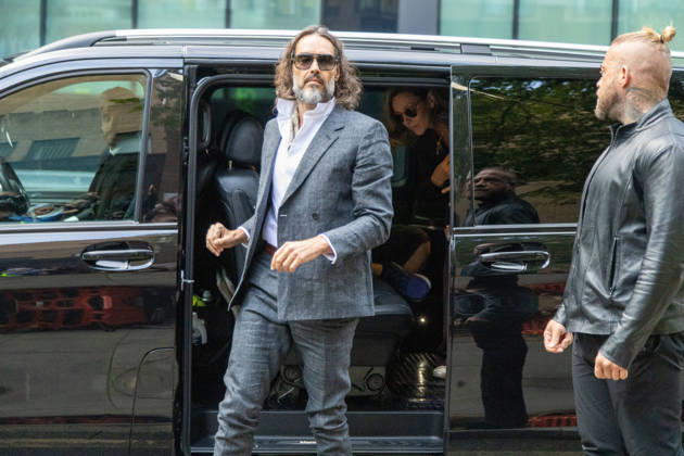 October 12, 2026, London, England, United Kingdom: RUSSELL BRAND arrives at Southwark Crown Court, where he is facing three charges of rape, indecent assault, and three counts of sexual assault, relating to six women. London United Kingdom - ZUMAs262 20261012_zip_s262_007 Copyright: xTayfunxSalcix