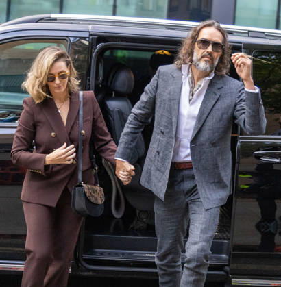 October 12, 2026, London, England, United Kingdom: RUSSELL BRAND with his wife LAURA arrives at Southwark Crown Court, where he is facing three charges of rape, indecent assault, and three counts of sexual assault, relating to six women. London United Kingdom - ZUMAs262 20261012_zip_s262_008 Copyright: xTayfunxSalcix
