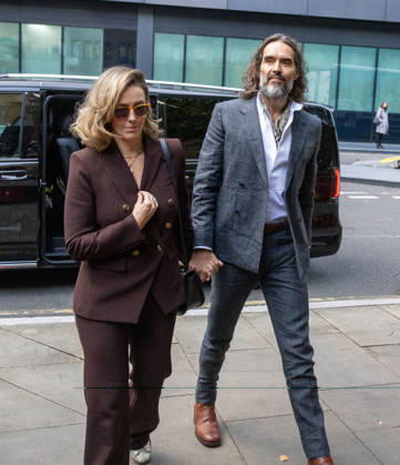 October 12, 2026, London, England, United Kingdom: RUSSELL BRAND with his wife LAURA arrives at Southwark Crown Court, where he is facing three charges of rape, indecent assault, and three counts of sexual assault, relating to six women. London United Kingdom - ZUMAs262 20261012_zip_s262_017 Copyright: xTayfunxSalcix