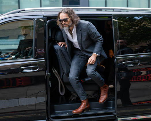 October 12, 2026, London, England, United Kingdom: Actor and comedian Russell BRAND arrives at Southwark Crown Court in London, United Kingdom, on October 12, 2026, as his trial begins on charges of rape, sexual assault and indecent assault. BRAND denies all the charges and has pleaded not guilty. London United Kingdom - ZUMAk172 20261012_zip_k172_002 Copyright: xThomasxKrychx