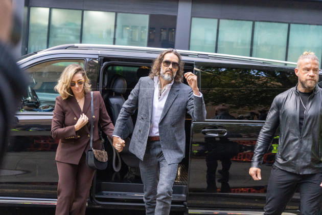 October 12, 2026, London, England, United Kingdom: RUSSELL BRAND with his wife LAURA arrives at Southwark Crown Court, where he is facing three charges of rape, indecent assault, and three counts of sexual assault, relating to six women. London United Kingdom - ZUMAs262 20261012_zip_s262_018 Copyright: xTayfunxSalcix