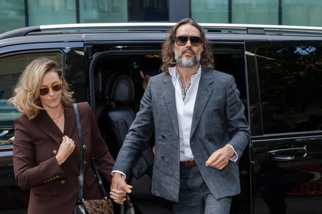 October 12, 2026, London, England, United Kingdom: Actor and comedian Russell BRAND arrives at Southwark Crown Court with his wife, Laura, in London, United Kingdom, on October 12, 2026, as his trial begins on charges of rape, sexual assault and indecent assault. BRAND has pleaded not guilty to all charges. London United Kingdom - ZUMAk172 20261012_zip_k172_008 Copyright: xThomasxKrychx
