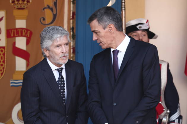 October 12 Parade for Hispanic Heritage Day: Interior Minister Fernando Grande Marlaska, and Prime Minister Pedro Sánchez, during the solemn ceremony honoring the national flag and the military parade for October 12, Hispanic Heritage Day, in Plaza de Cánovas del Castillo, on October 12, 2026, in Madrid, Spain. The events begin with the flag-raising ceremony and are followed by a tribute to those who gave their lives for the country. Subsequently, the military air and ground parades begin. Approximately 4,400 members of the Armed Forces, the security forces, and various civilian public institutions are participating this year in the parade presided over by the King and Queen. The aerial parade featured 50 fighter, training, and transport a Copyright: xEduardoxParrax 7840643