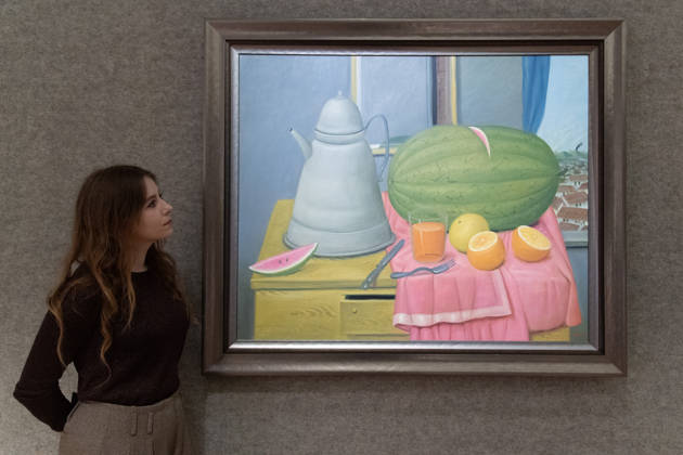 Bonhams 20th 21st Century Art Day Evening Sales Highlights Photocall - Bonhams, London, UK - 12 October, 2026 A staff member views Still Life with Watermelon by Fernando Botero (est. £220k - £350k) as part of Bonhams 20th 21st Century Art Day Evening Sales which is to go on auction from 15th - 16th October 2026 at Bonhams in London, England, UK on Monday 12 October, 2026., Credit:Justin Ng Avalon UK, England, London, Bonhams Copyright: xJustinxNgx xAvalonx 1142586626