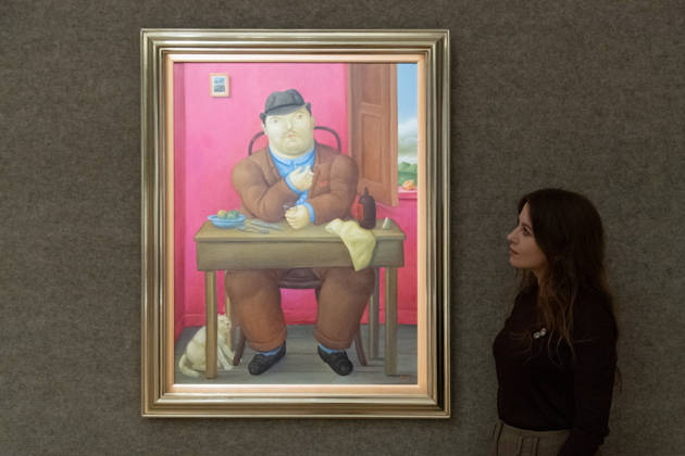 Bonhams 20th 21st Century Art Day Evening Sales Highlights Photocall - Bonhams, London, UK - 12 October, 2026 A staff member views Homme à Table by Fernando Botero (est. £250k - £350k) as part of Bonhams 20th 21st Century Art Day Evening Sales which is to go on auction from 15th - 16th October 2026 at Bonhams in London, England, UK on Monday 12 October, 2026., Credit:Justin Ng Avalon UK, England, London, Bonhams Copyright: xJustinxNgx xAvalonx 1142586634