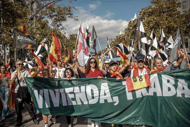 October 12, 2026, Barcelona, Catalonia, Spain: Demonstrators carry flags and banners during a rally marking SpainÃ¢â‚¬â ¢s National Day. Barcelona Spain - ZUMAo105 20261012_fap_o105_001 Copyright: xMatthiasxOesterlex