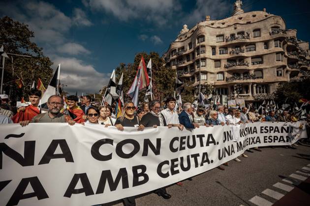 October 12, 2026, Barcelona, Catalonia, Spain: Demonstrators march behind a banner reading Catalonia with Ceuta. One Spain during a rally marking SpainÃ¢â‚¬â ¢s National Day. Barcelona Spain - ZUMAo105 20261012_fap_o105_006 Copyright: xMatthiasxOesterlex