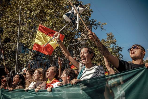 October 12, 2026, Barcelona, Catalonia, Spain: Demonstrators chant slogans behind a banner during a rally marking SpainÃ¢â‚¬â ¢s National Day. Barcelona Spain - ZUMAo105 20261012_fap_o105_011 Copyright: xMatthiasxOesterlex