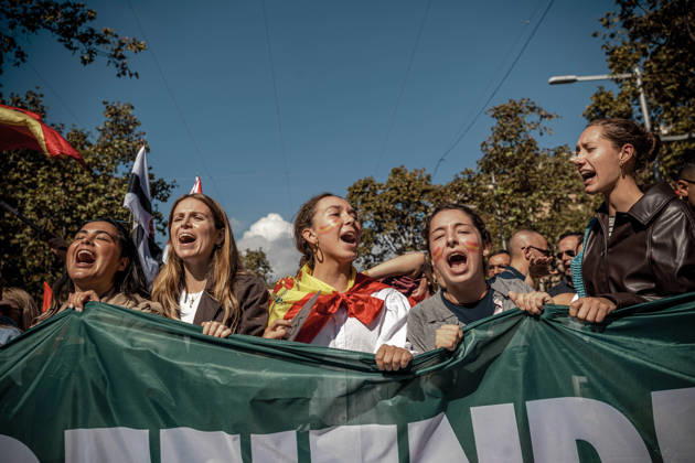 October 12, 2026, Barcelona, Catalonia, Spain: Demonstrators chant slogans behind a banner during a rally marking SpainÃ¢â‚¬â ¢s National Day. Barcelona Spain - ZUMAo105 20261012_fap_o105_018 Copyright: xMatthiasxOesterlex
