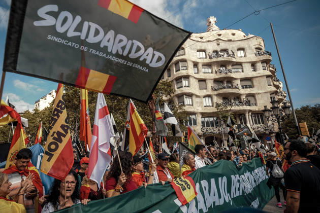 October 12, 2026, Barcelona, Catalonia, Spain: Demonstrators carry flags and banners during a rally marking SpainÃ¢â‚¬â ¢s National Day. Barcelona Spain - ZUMAo105 20261012_fap_o105_021 Copyright: xMatthiasxOesterlex