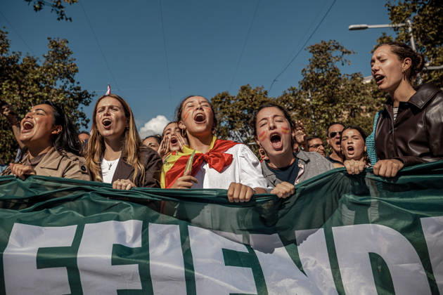 October 12, 2026, Barcelona, Catalonia, Spain: Demonstrators chant slogans behind a banner during a rally marking SpainÃ¢â‚¬â ¢s National Day. Barcelona Spain - ZUMAo105 20261012_fap_o105_024 Copyright: xMatthiasxOesterlex