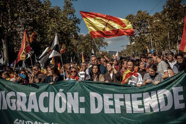 October 12, 2026, Barcelona, Catalonia, Spain: Demonstrators chant slogans behind a banner during a rally marking SpainÃ¢â‚¬â ¢s National Day. Barcelona Spain - ZUMAo105 20261012_fap_o105_025 Copyright: xMatthiasxOesterlex