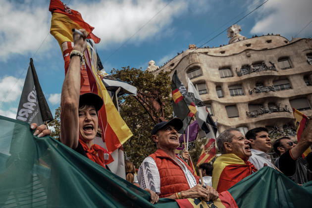 October 12, 2026, Barcelona, Catalonia, Spain: Demonstrators chant slogans behind a banner during a rally marking SpainÃ¢â‚¬â ¢s National Day. Barcelona Spain - ZUMAo105 20261012_fap_o105_027 Copyright: xMatthiasxOesterlex