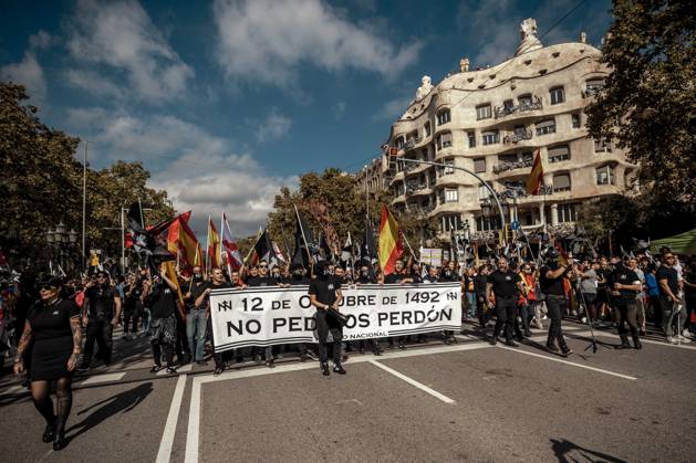 October 12, 2026, Barcelona, Catalonia, Spain: Demonstrators march behind a banner reading October 12, 1492: We do not ask for forgiveness. during a rally marking SpainÃ¢â‚¬â ¢s National Day Barcelona Spain - ZUMAo105 20261012_fap_o105_034 Copyright: xMatthiasxOesterlex