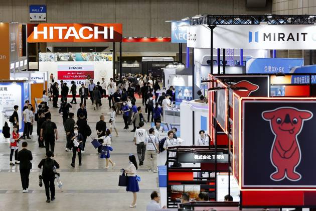 CEATEC electronics show People visit the Combined Exhibition of Advanced Technologies electronics show, known as CEATEC, at the Makuhari Messe convention center in the eastern Japan city of Chiba on Oct. 13, 2026, the opening day of the four-day event.  A14AA0005630736P