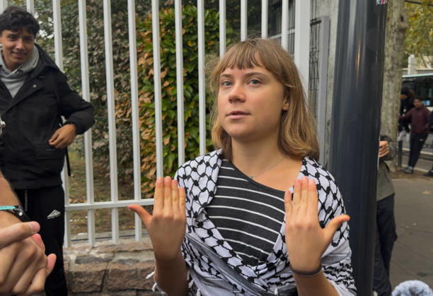 Greta Thunberg During Student Protest - Saint-Denis Videograbs - Swedish activist Greta Thunberg looks on as she arrives to take part in a blockade at the Lycee Paul Eluard in Saint-Denis, on the outskirts of Paris on October 13, 2026, as part of a nationwide student mobilisation. France sees nationwide demonstrations on October 13 in support of students protesting poor classroom conditions for weeks, as authorities and participants remain wary of further violence. Photo by CLPRESS ABACAPRESS.COM Paris France  Copyright: xCLPRESS ABACAx